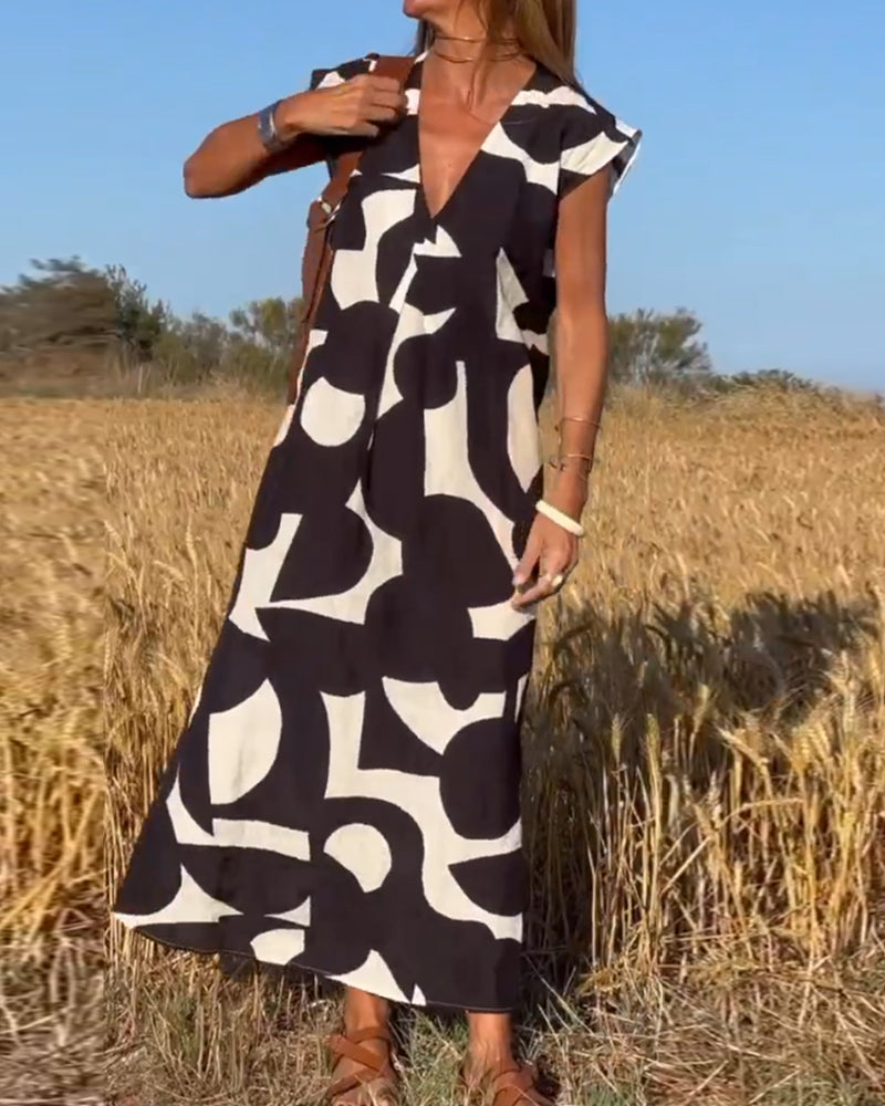 SITA – Printed Dress with V-Neckline